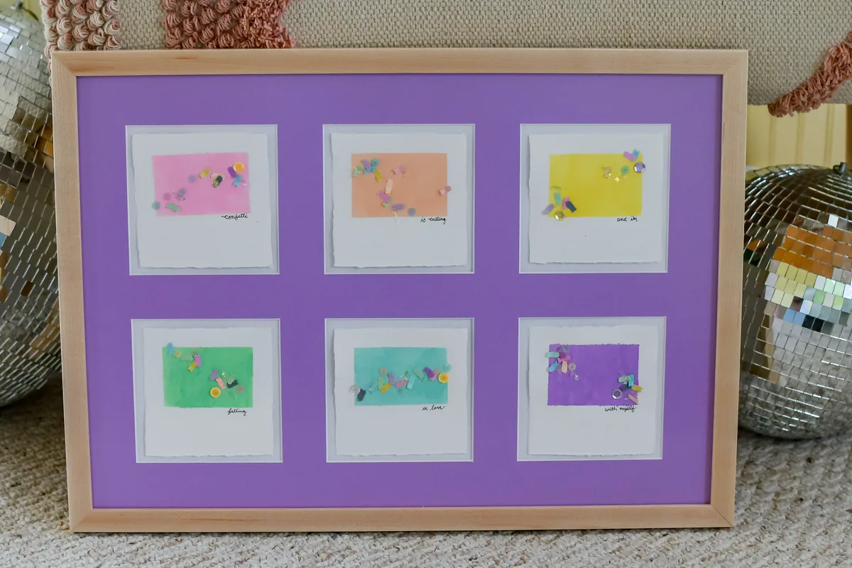 Collage frame of children's crafts with a purple matboard