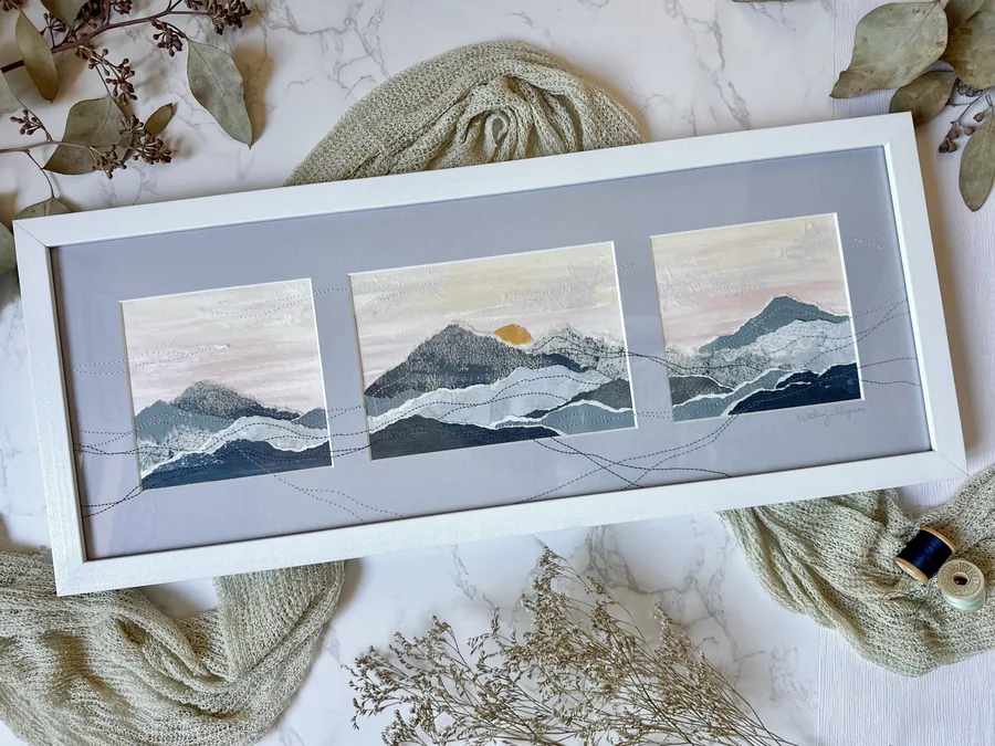 Three-opening collage frame of embroidered mountain artwork