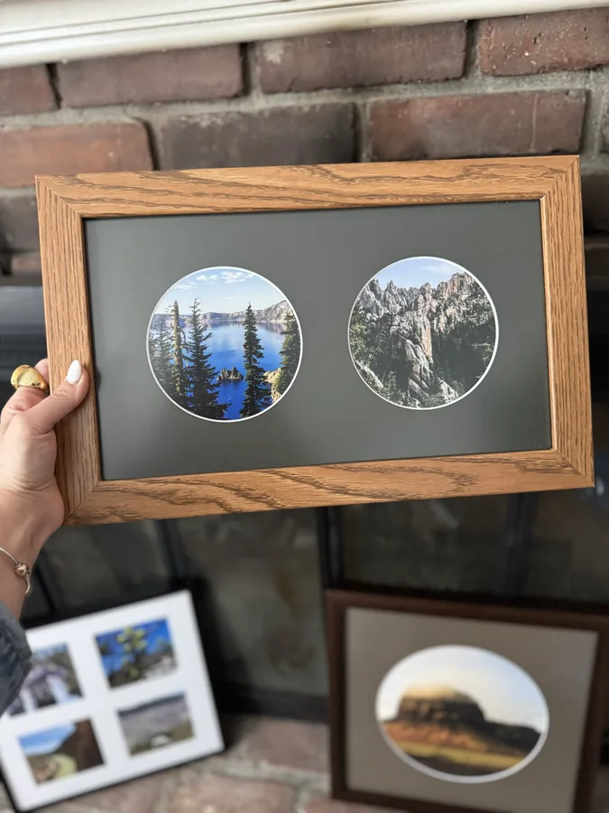 Wood collage frame with two round openings displaying nature photos