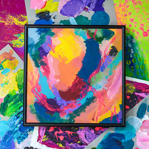painted art in frame on painted background