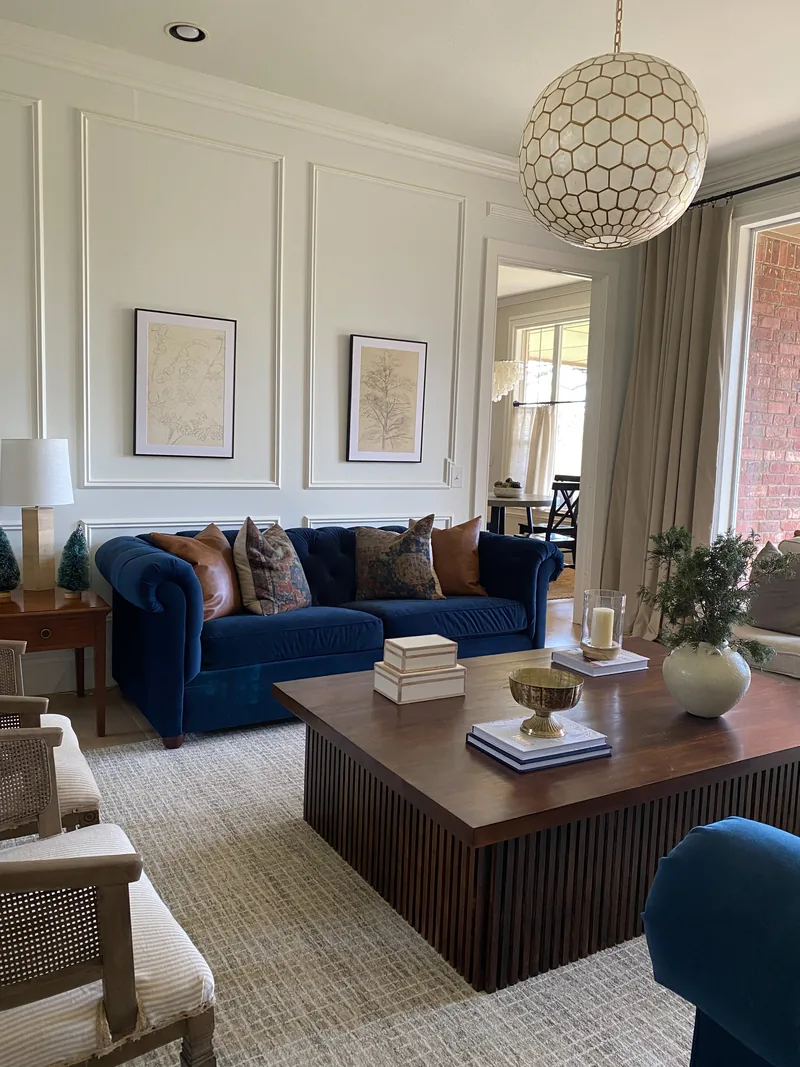 Luxury living room with picture frames hanging on the wall