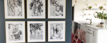 gallery wall of black and white family photos