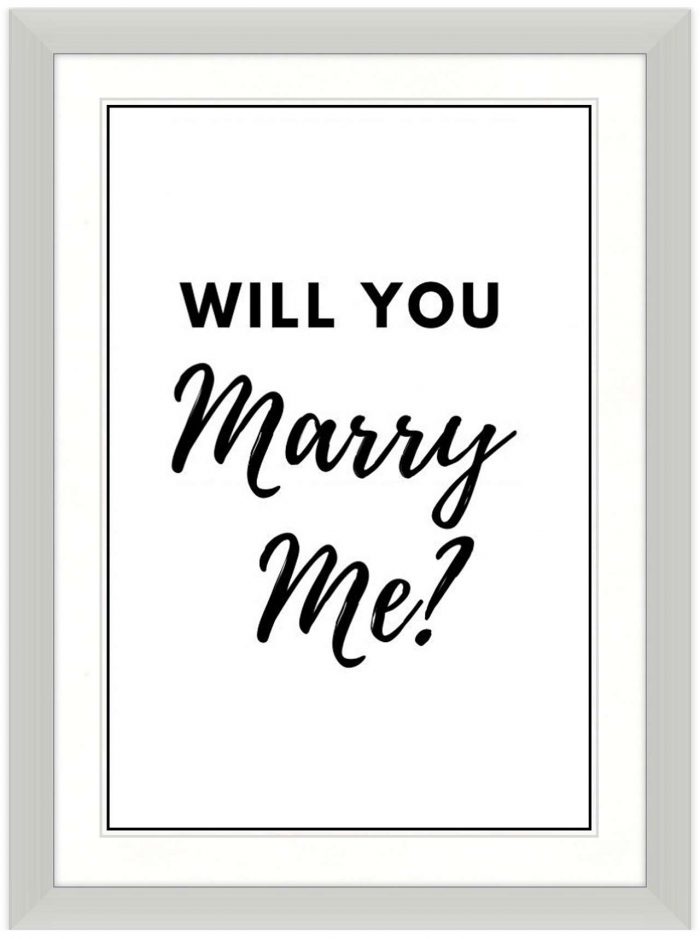 Unique wedding proposal in a picture frame