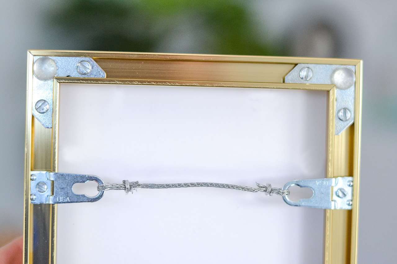 Metal picture frame hardware