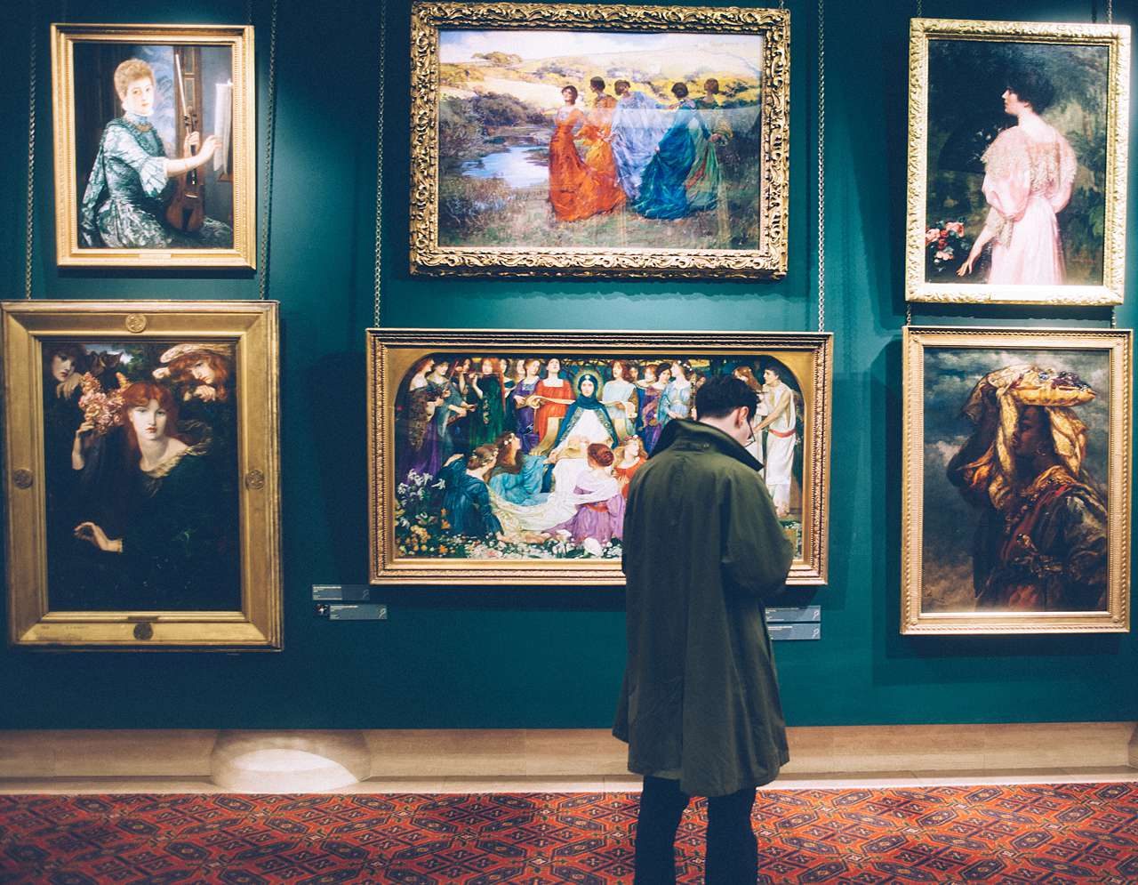 Museum paintings in ornate picture frames