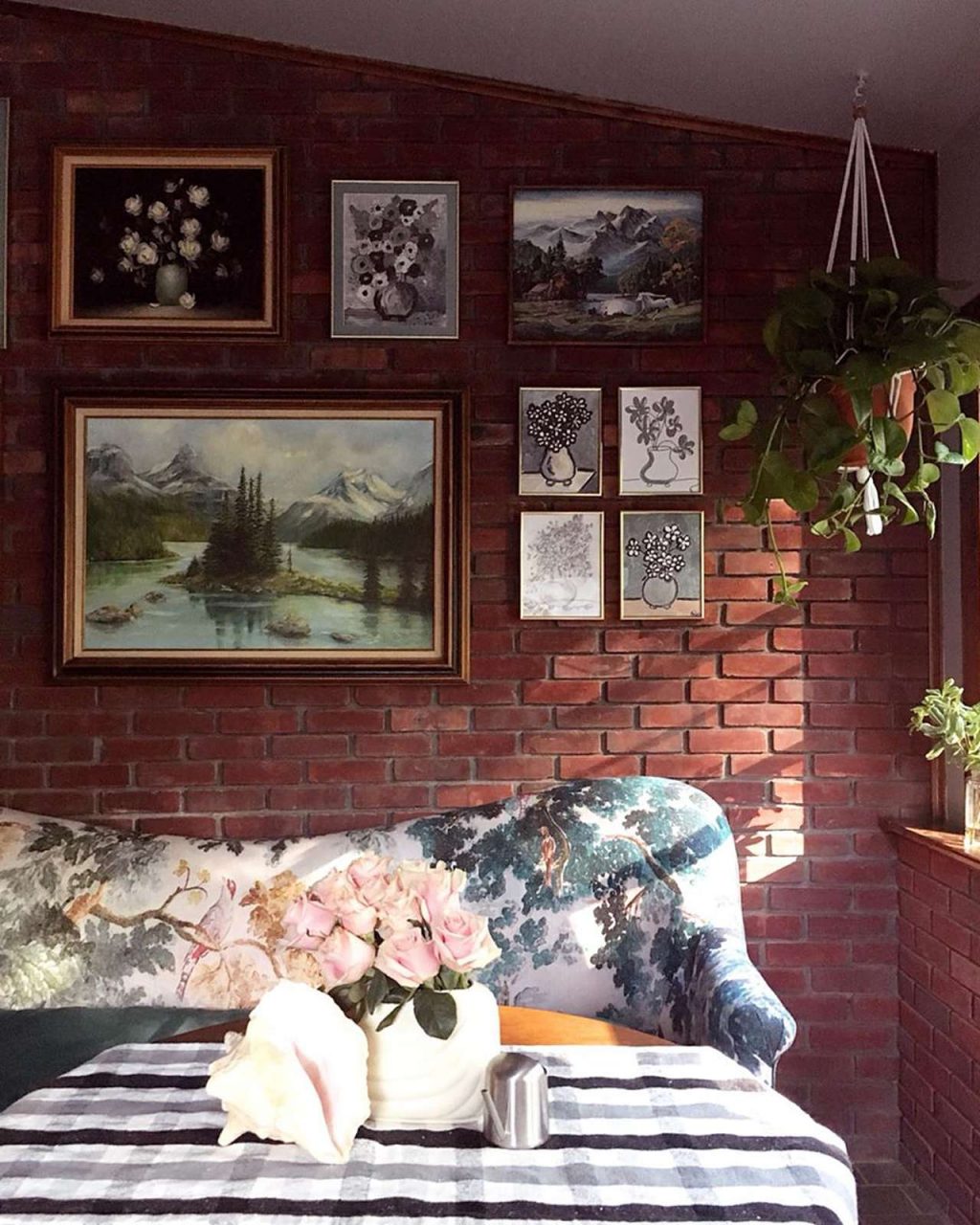 picture frame gallery on brick wall