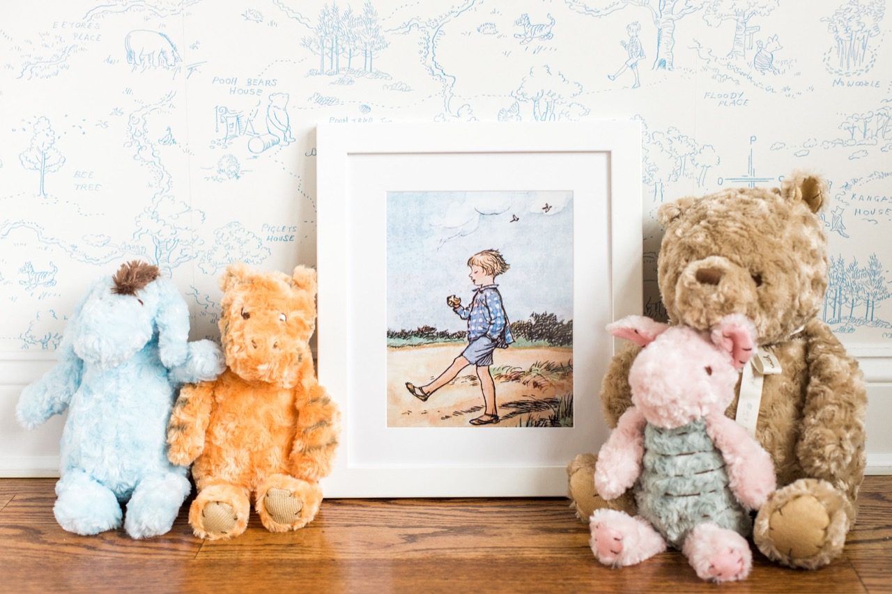 Framed Christopher Robin with stuffed animals 