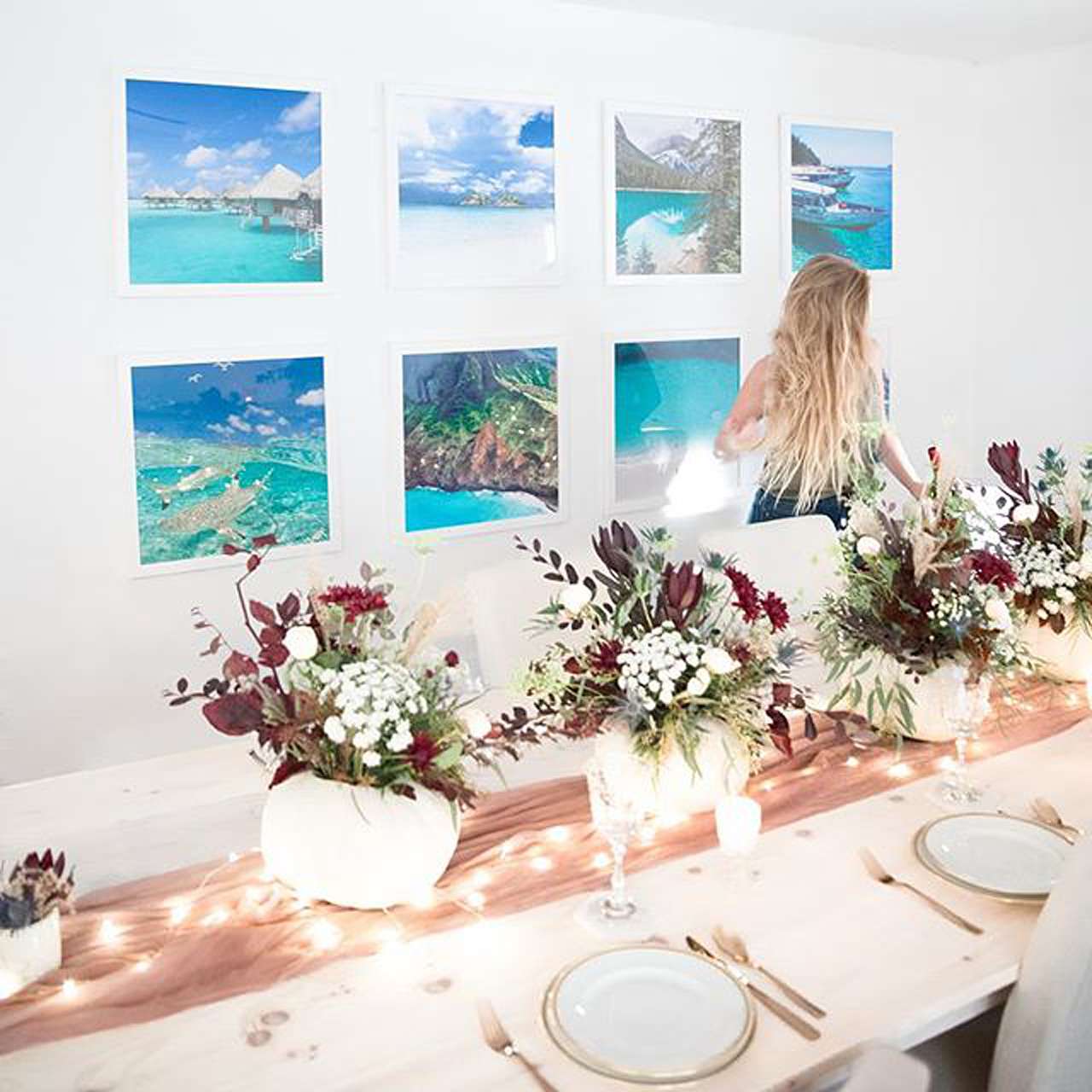 holiday table display with gallery wall
