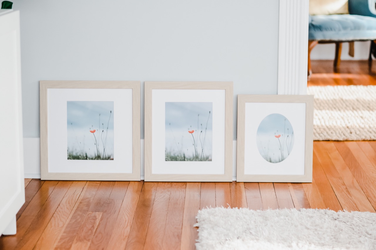 three floral photo frames