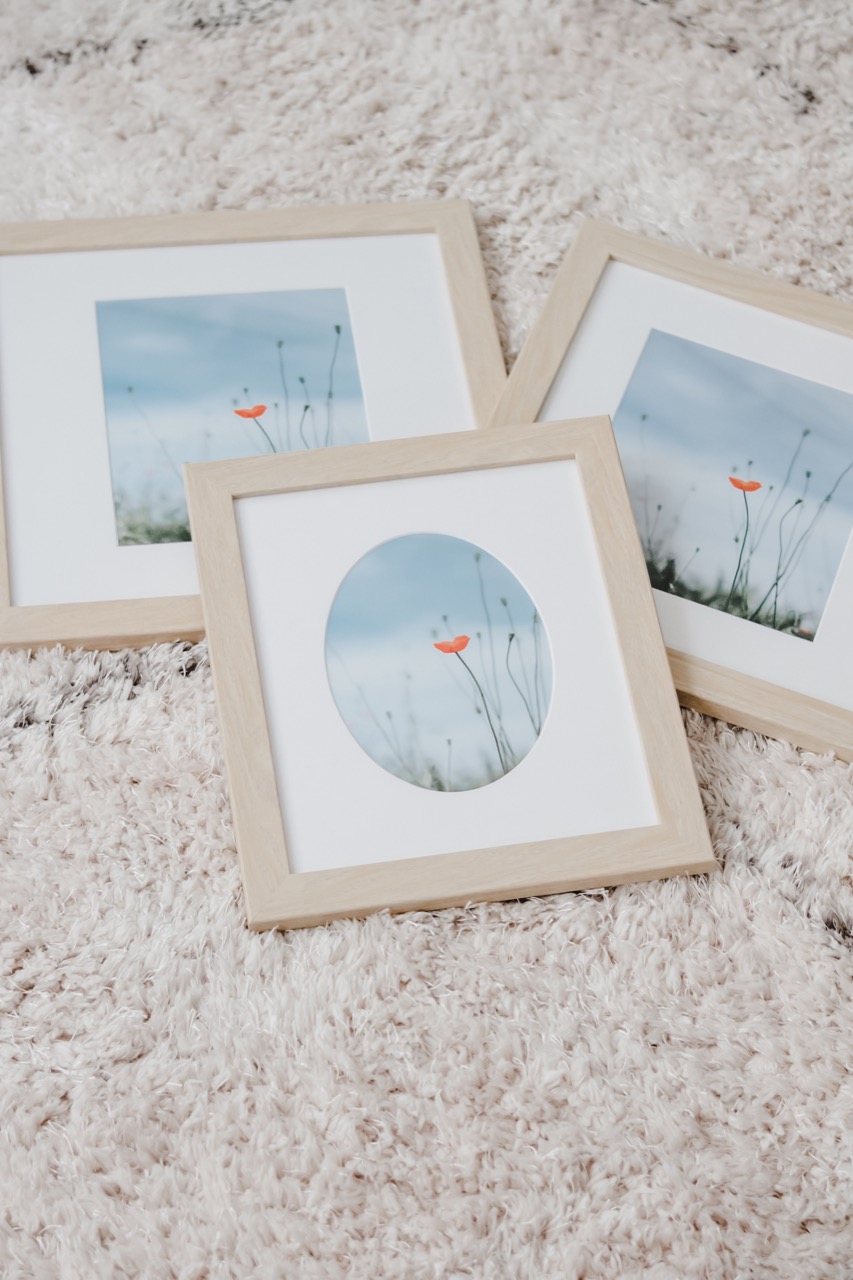 three photo frames with different matting sizes
