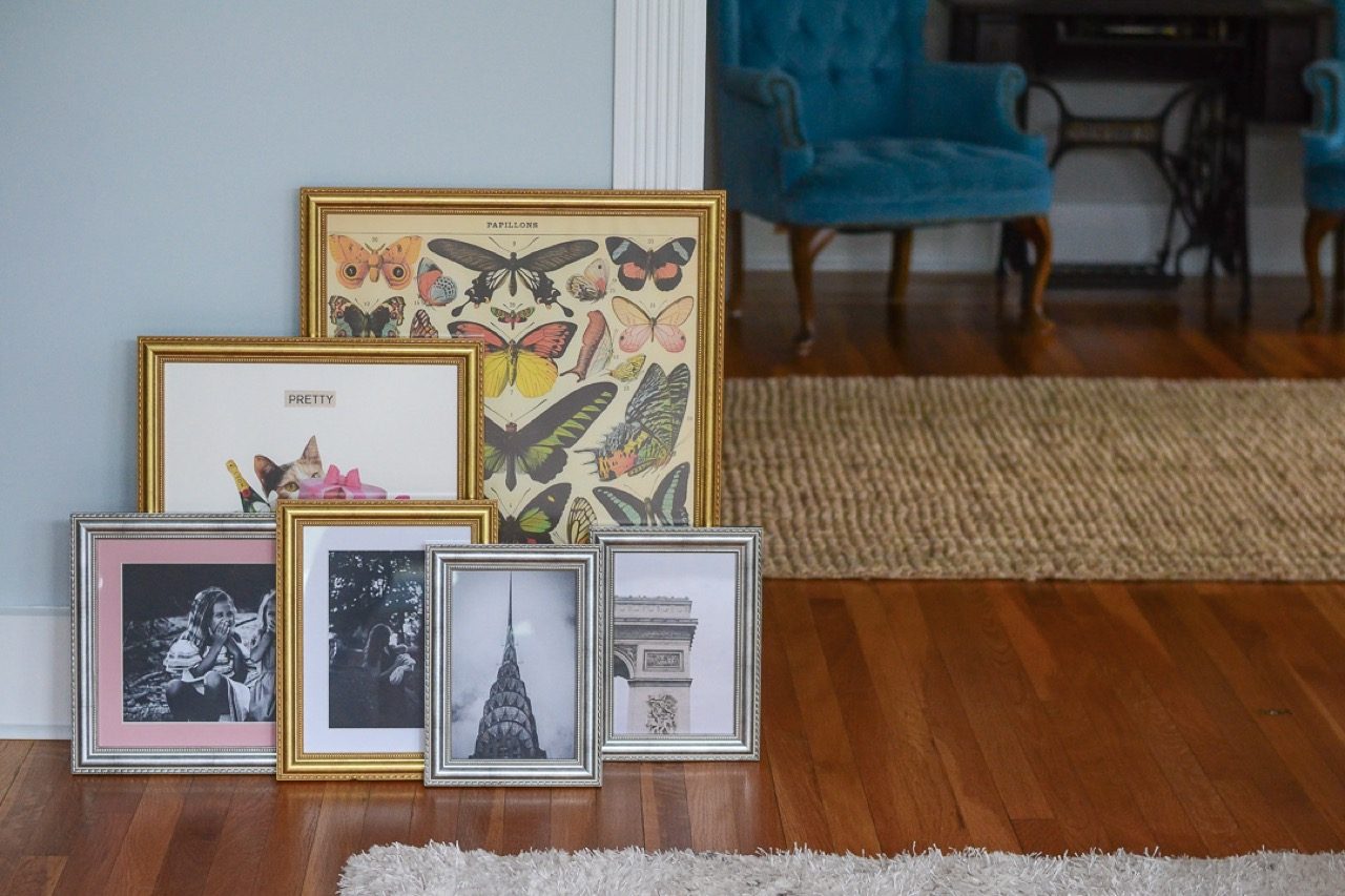 group of framed pieces- different styles 