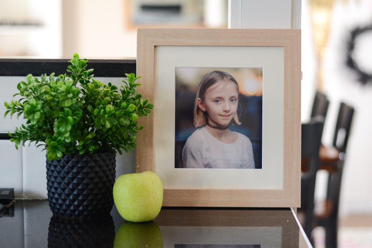 little girl framed school photo