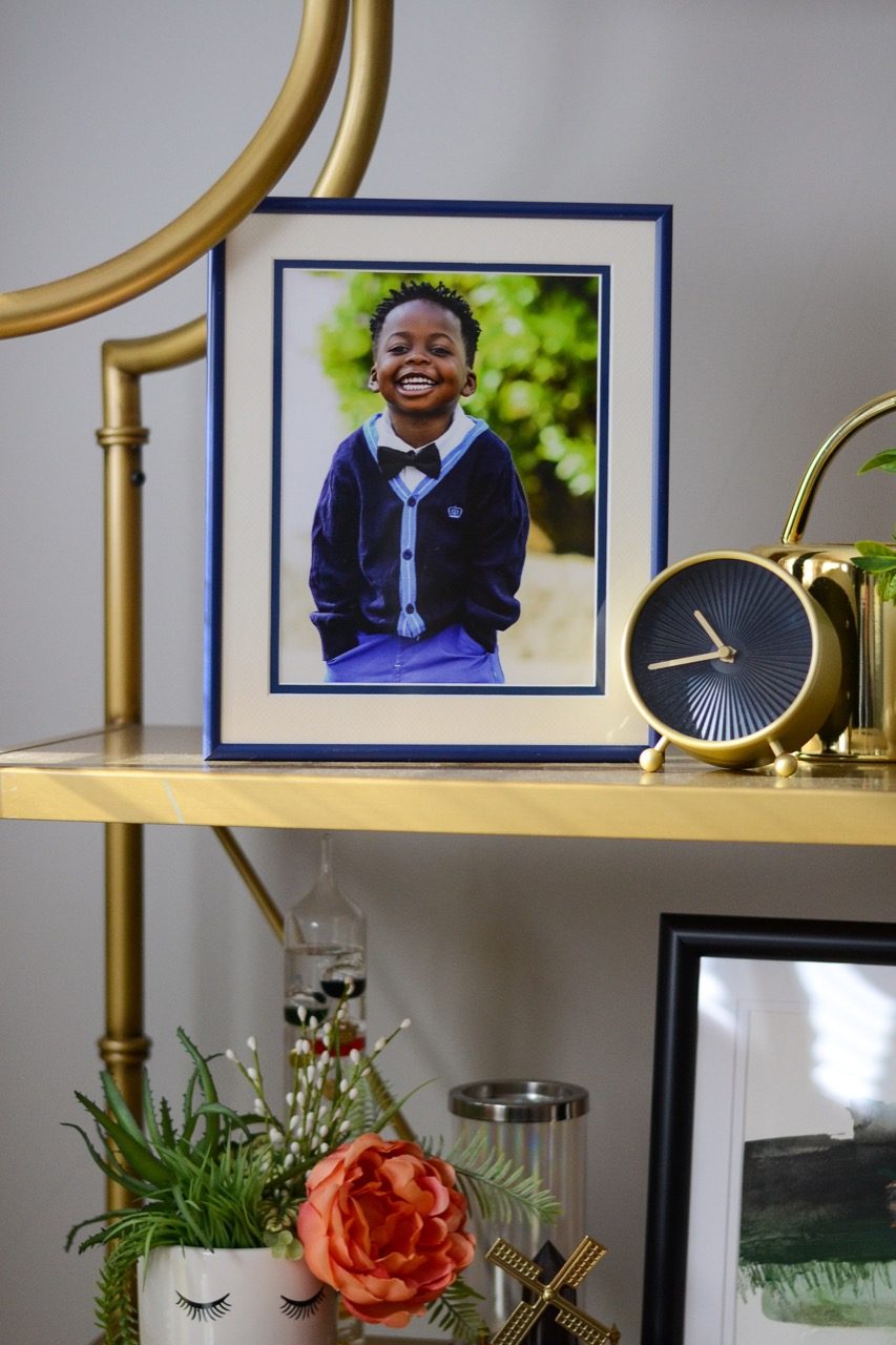 school photo on shelf-boy.