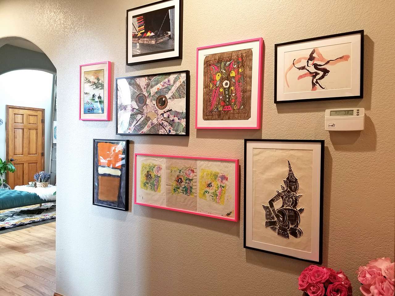 pink and black gallery wall