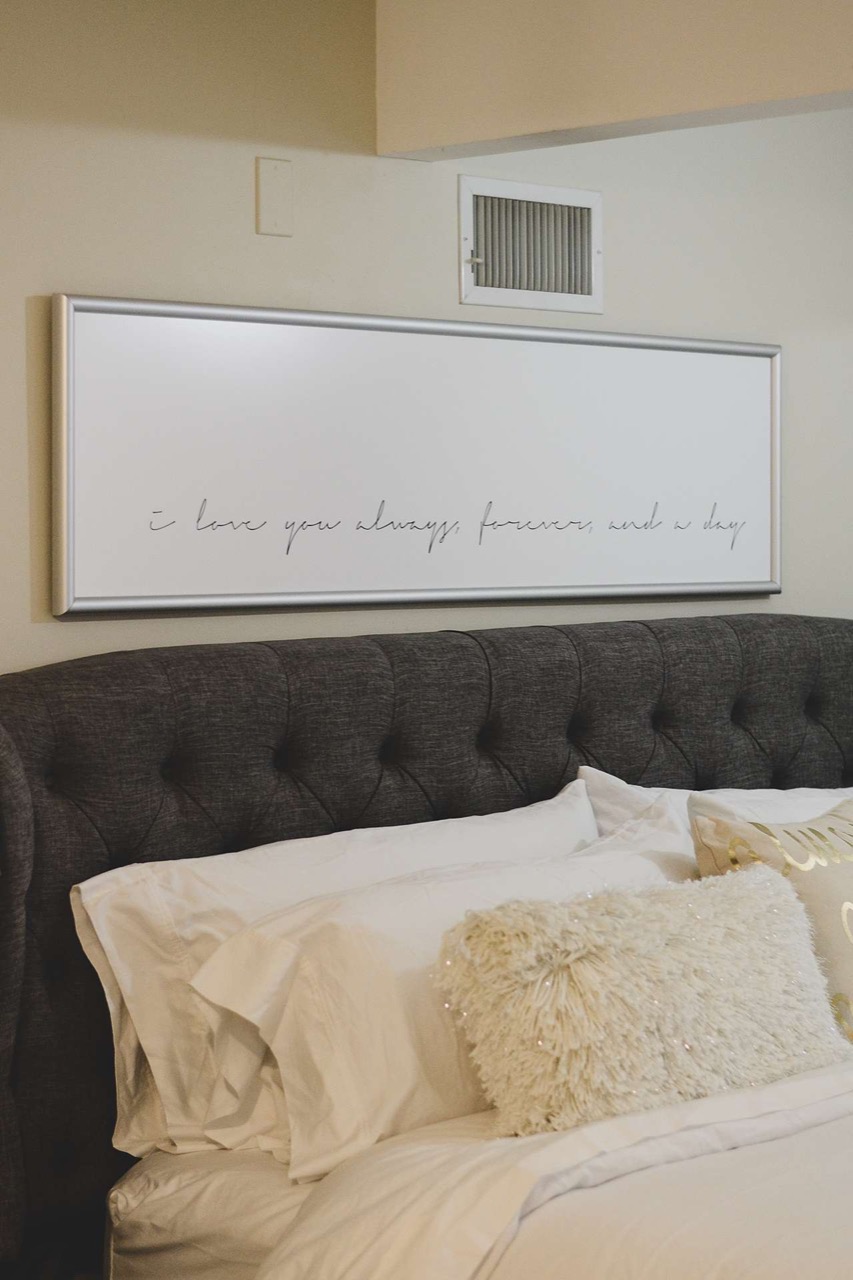 large picture above bed 