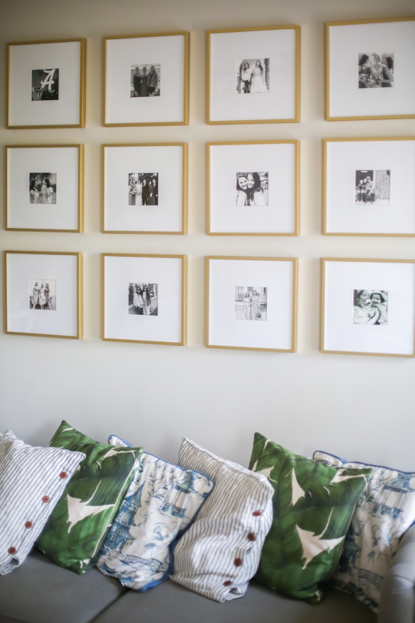 gallery wall of gold frames