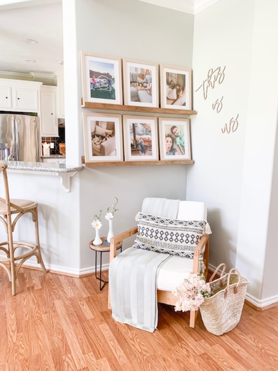 small gallery wall on shelves