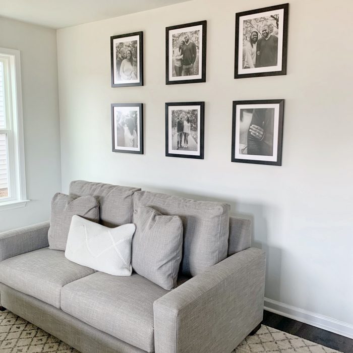 How to Hang a Frame on Any Wall - gallery wall in living room 