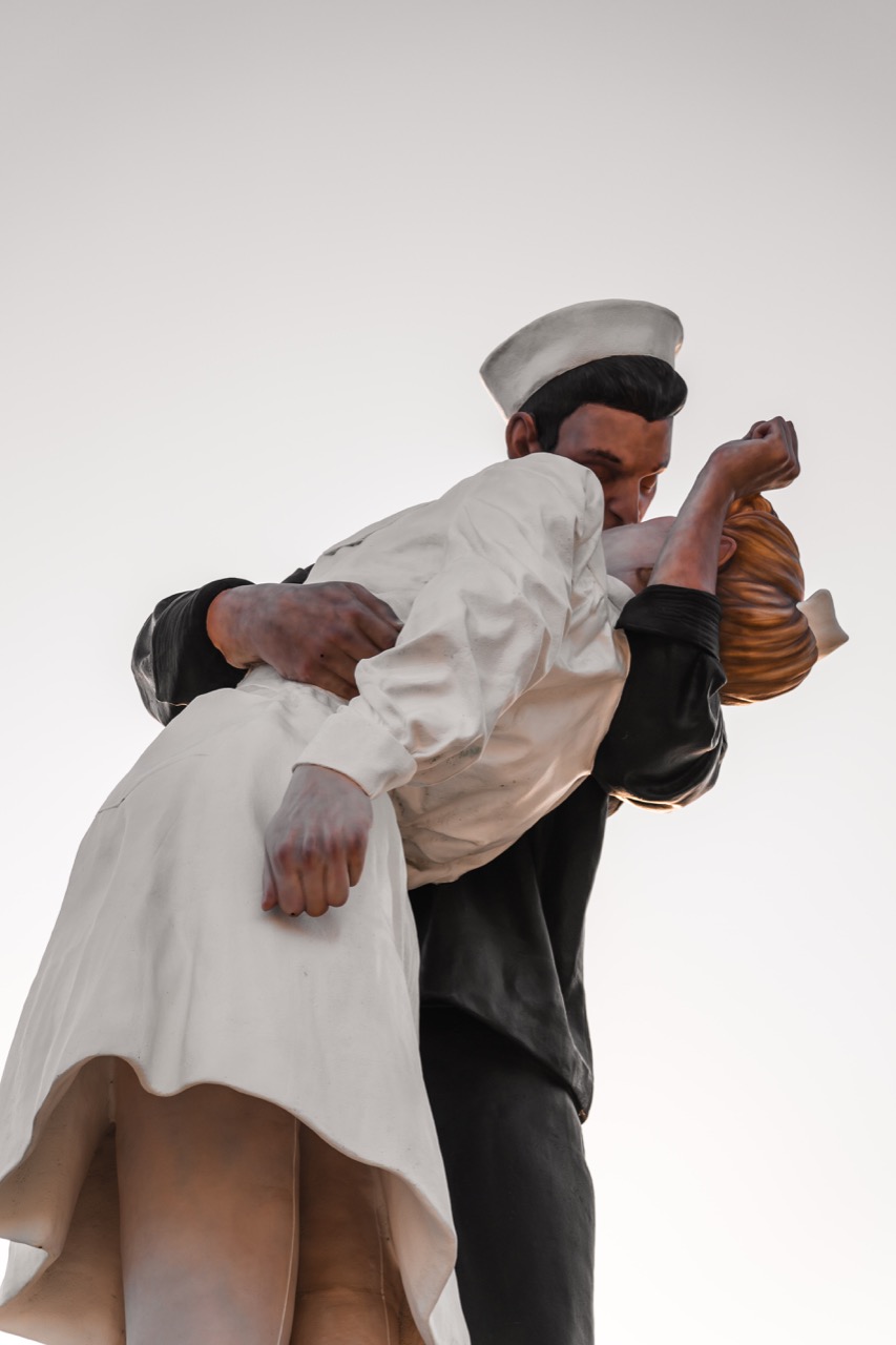 Sailor kissing nurse