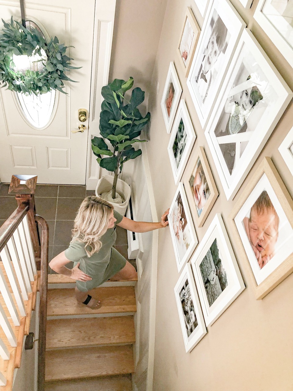 gallery wall on staircase wall 