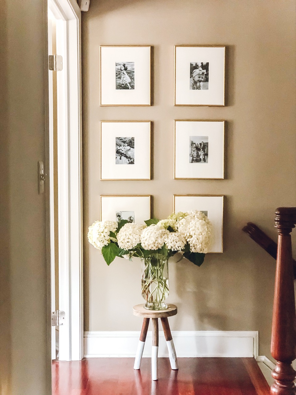 gallery wall in hallway 
