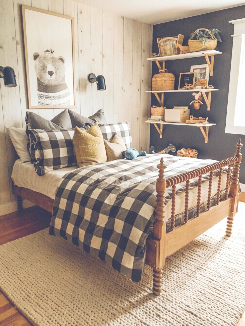 plaid bedspread with large wall art