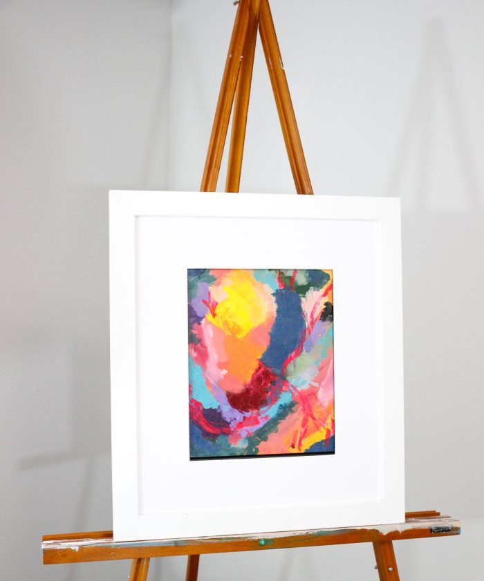 Promote Your Creative Artwork: Framed painting on an easel 