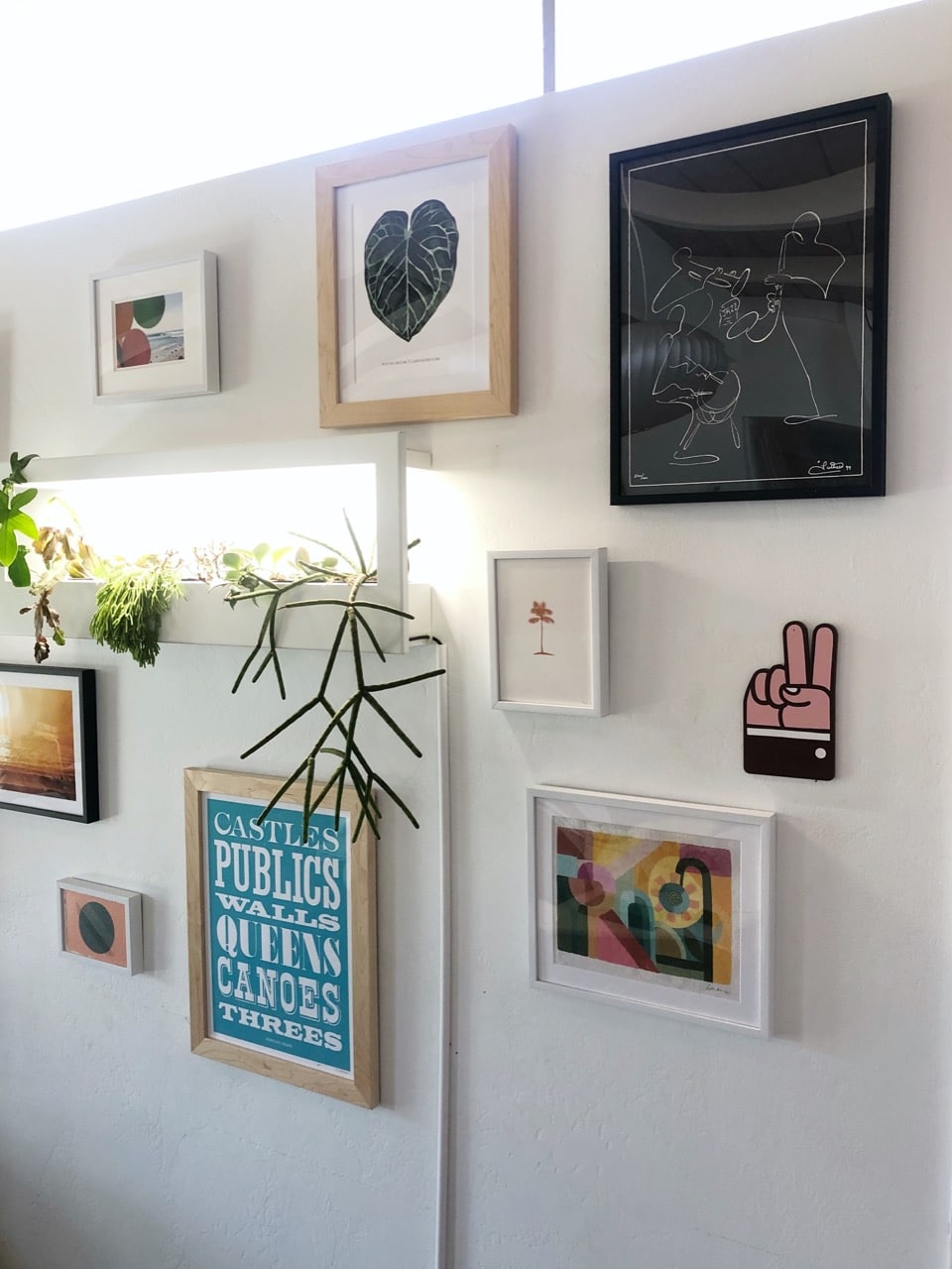 gallery wall with framed art 