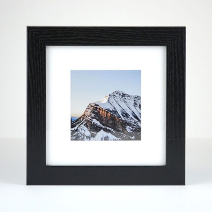 Derby frame in black with the mountain landscape.