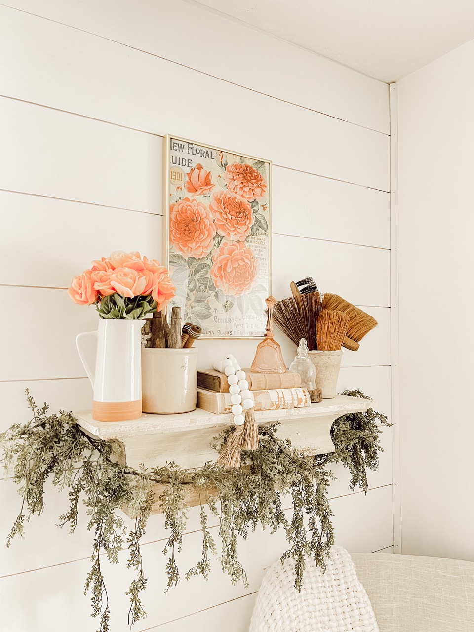 colorful art above a shelf 