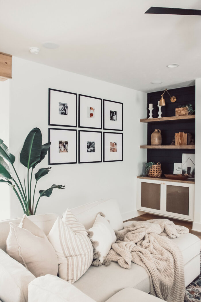 6 framed family photos in a living room