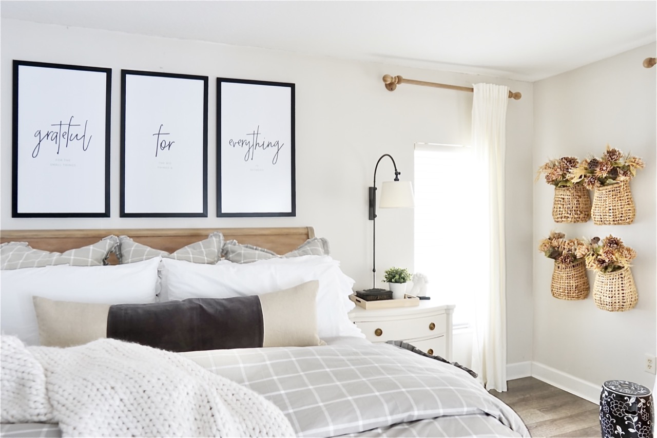 large frames above bed 