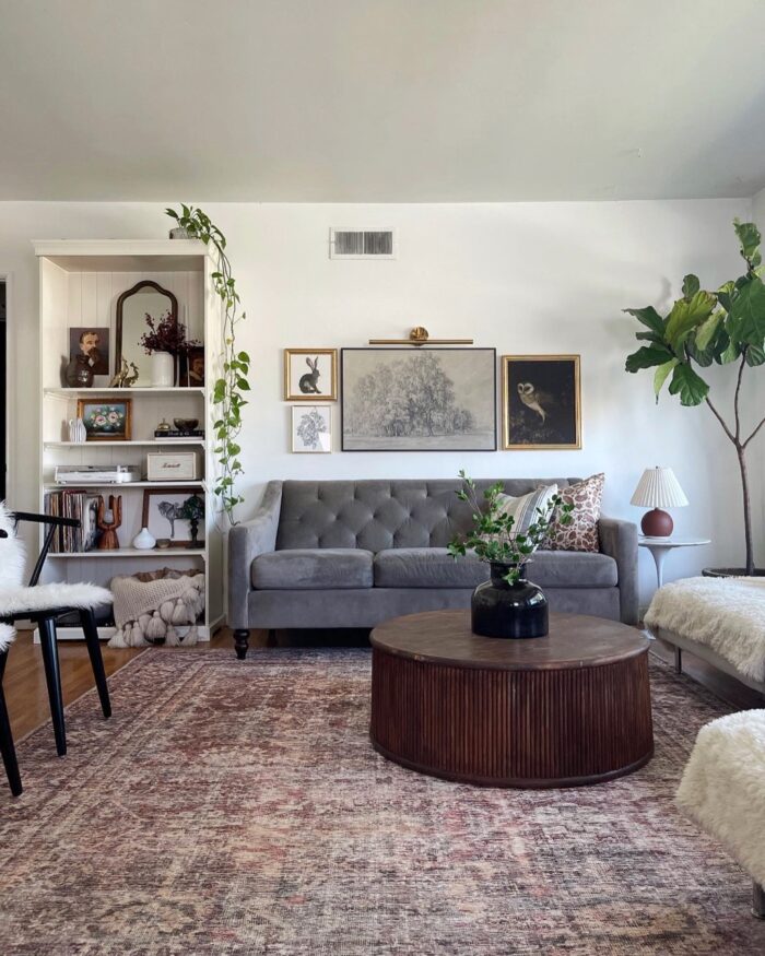 A classic and cozy living room with classical framed art 