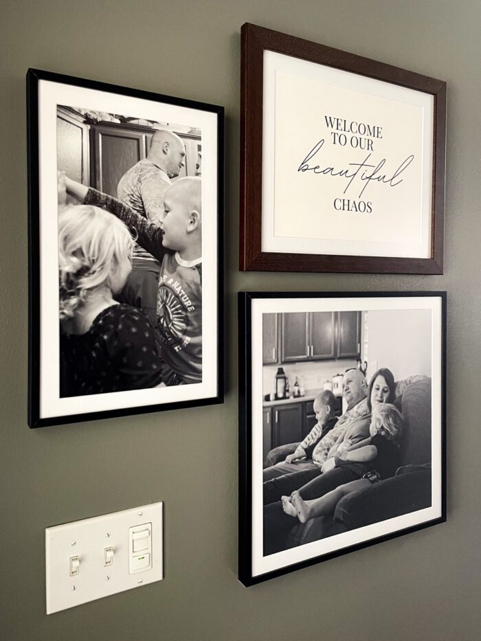 Home Staging Art and Decor Ideas- Three framed black and white photographs of a family.