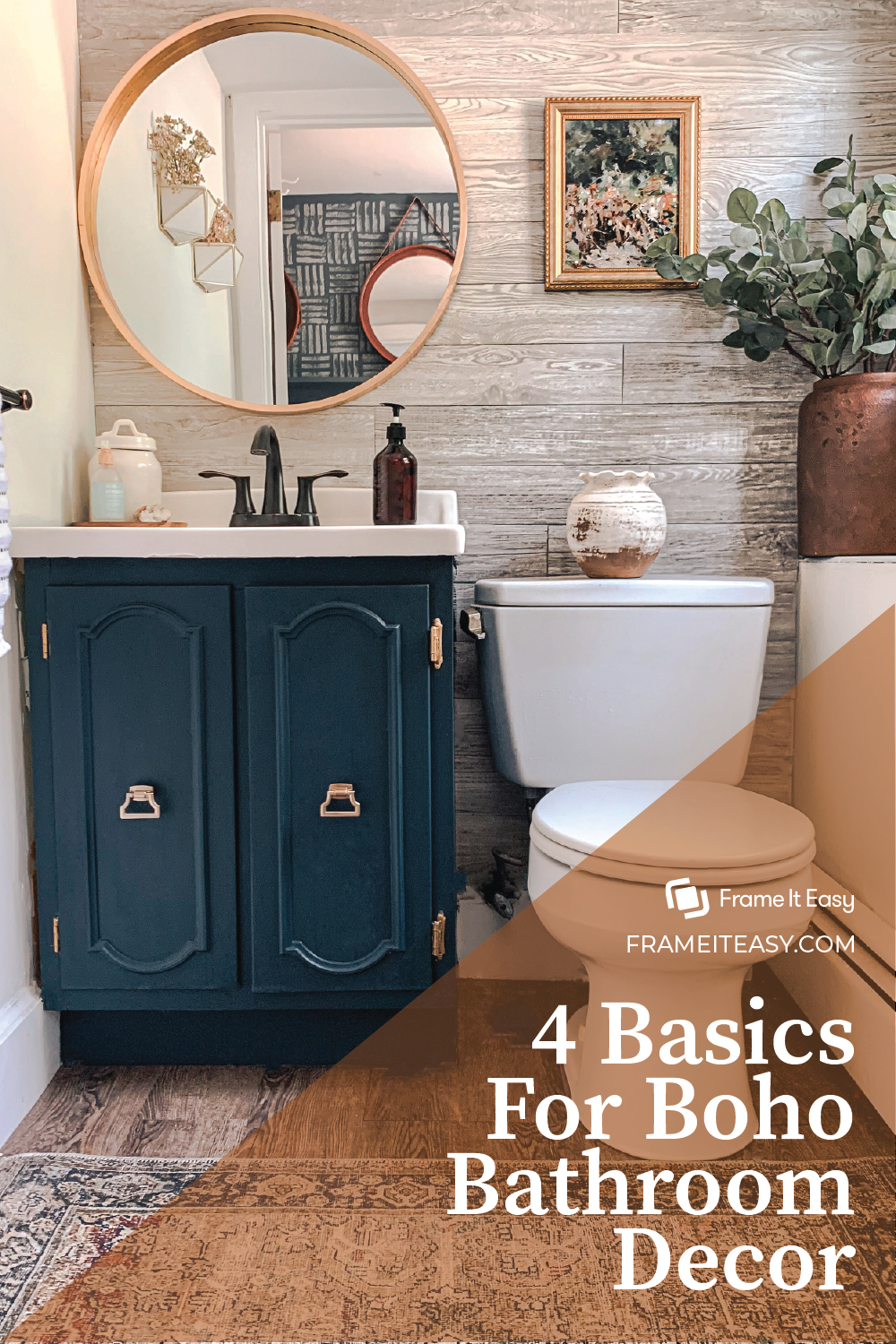 4 Basics for Boho Bathroom Decor- A bathroom that's layering with multiple textures and patterns within the wall, rug and artwork. There are neutral, worn colors with also pops of bright colors as well as a plant to add some greenery!
