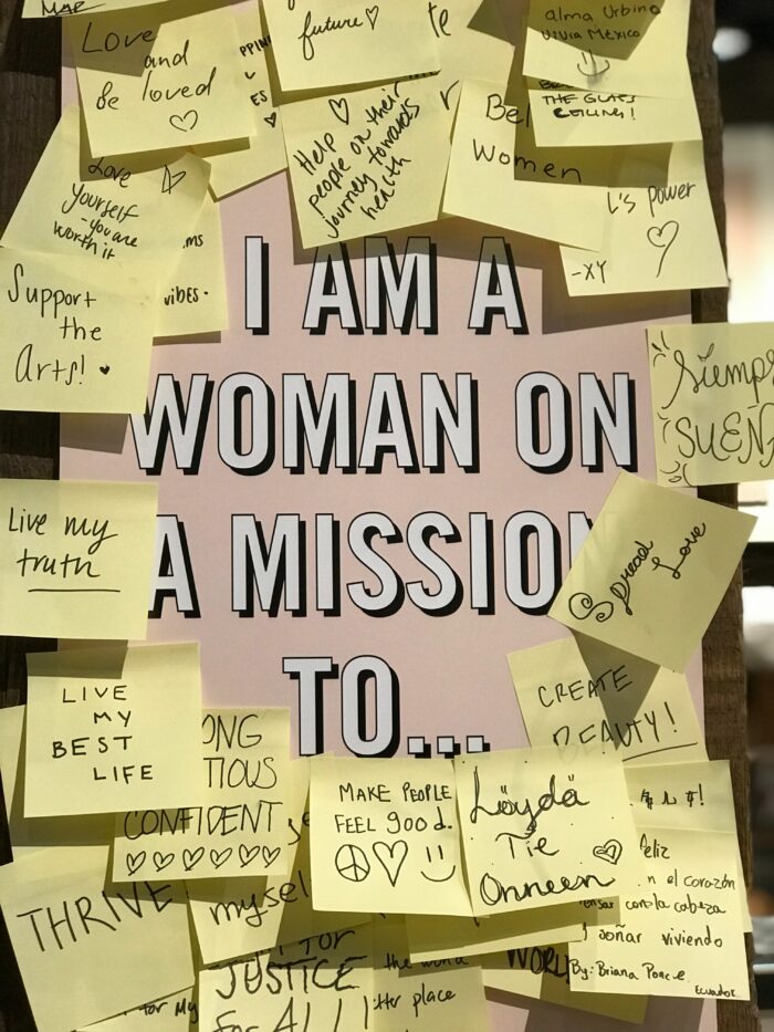 How To: Create and Frame a Vision Board- writing down a prompt like "I am a woman on a mission to..." and adding sticky notes with goals is a great way to get some ideas written down! 