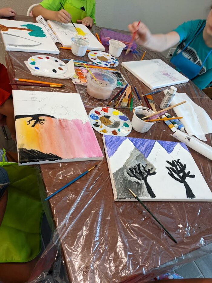 Framing children's art: Children painting at the table