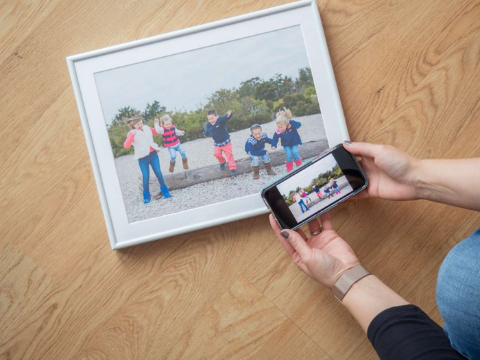 Framed photograph of kids playing.