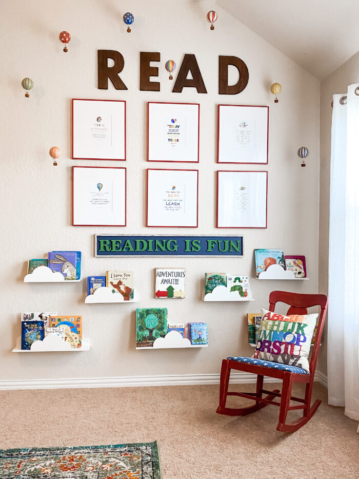 a grid wall display in a children's reading room