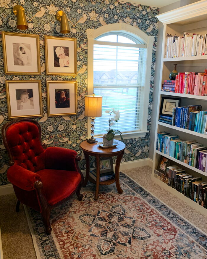 Book Nooks & Reading Corners: An ornate-styled reading room complete with wallpaper, rug, and bookshelf. 