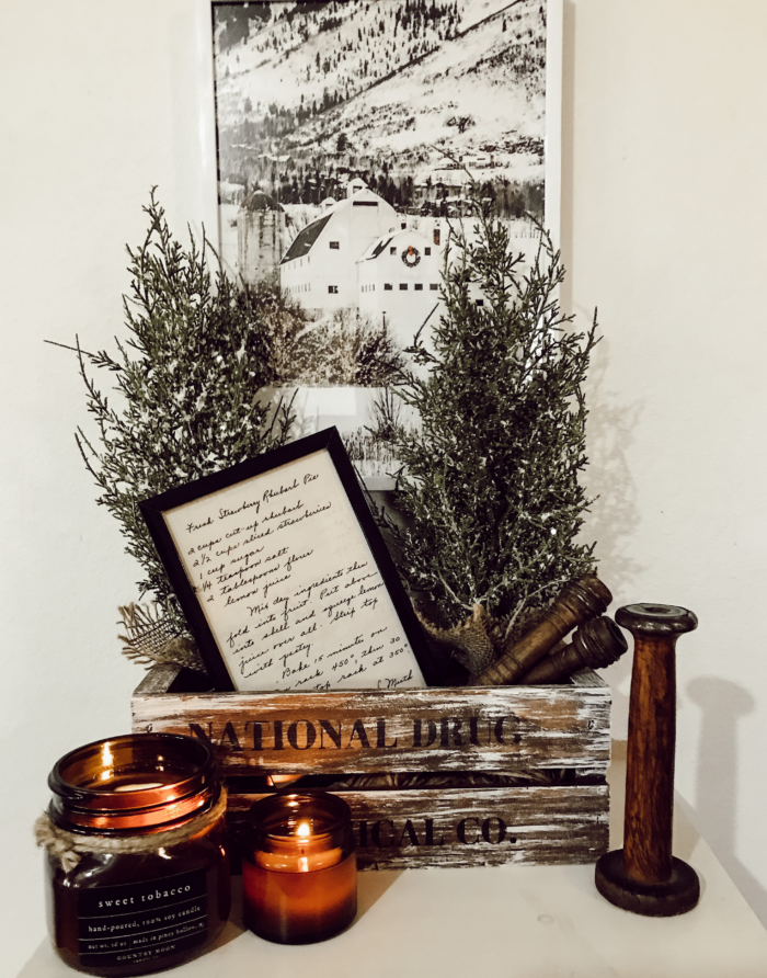 Cozy Fall Aesthetic: Black and white framed photo with candles.