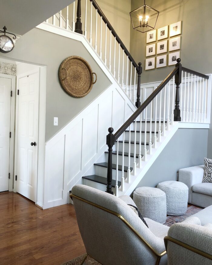 The Complete DIY Wall Repair Guide: Drywall hallway and staircase with frames.