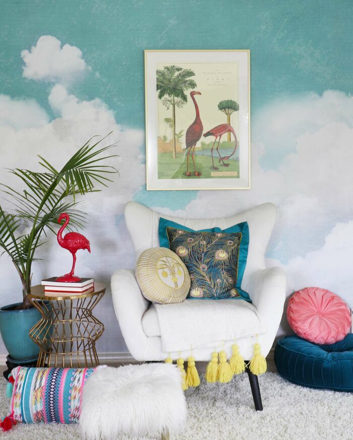 Book Nooks & Reading Corners: A tropical-themed reading space with cloud wallpaper and flamingo decor. 