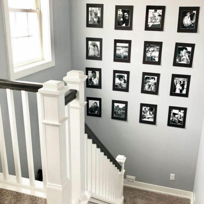 The Complete DIY Wall Repair Guide: stairwell with large gallery wall