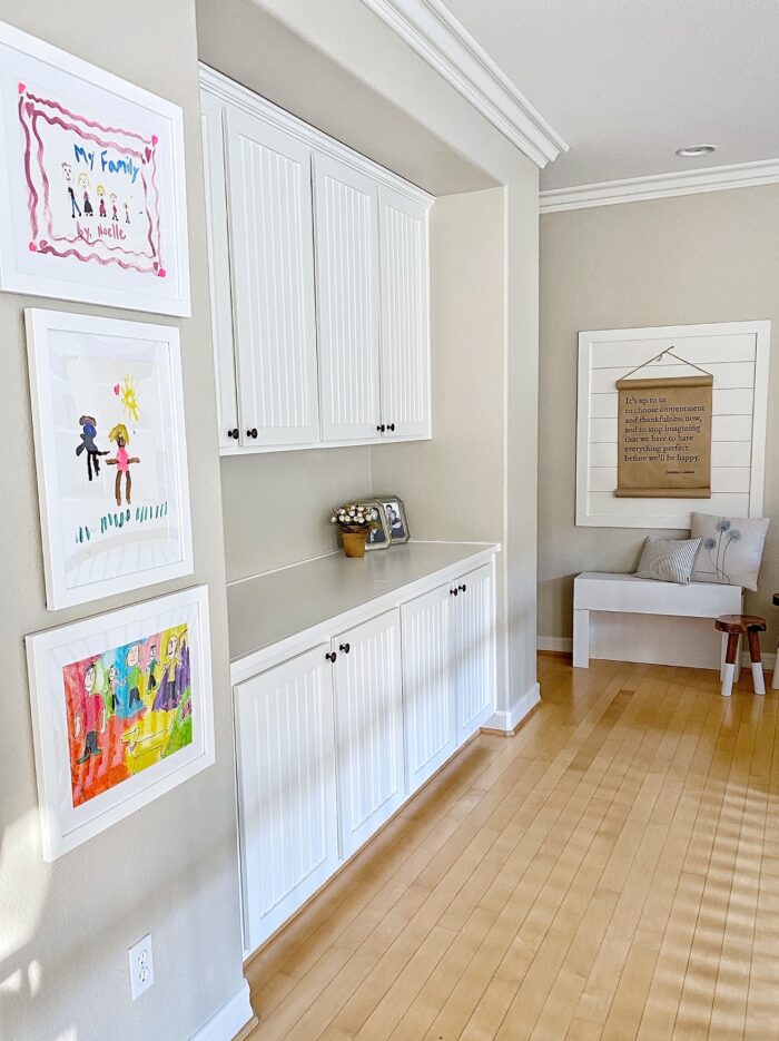 Framing Children's Art: A small gallery wall by a snack bar!