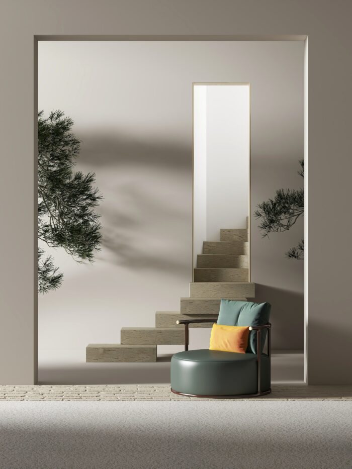 Asian zen-inspired room with plants and a green armchair. 