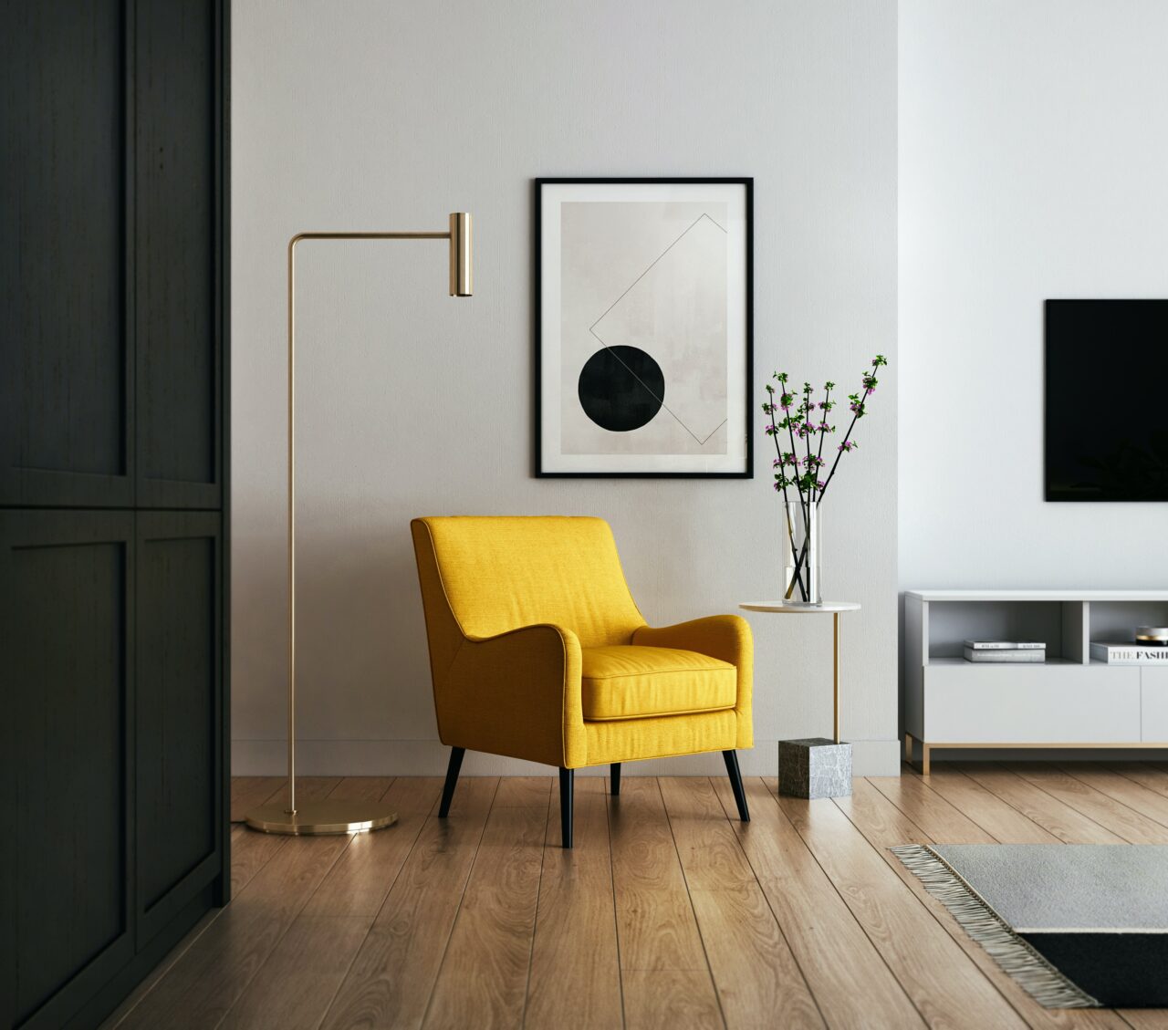 Modern office decor with yellow chair and framed art print.