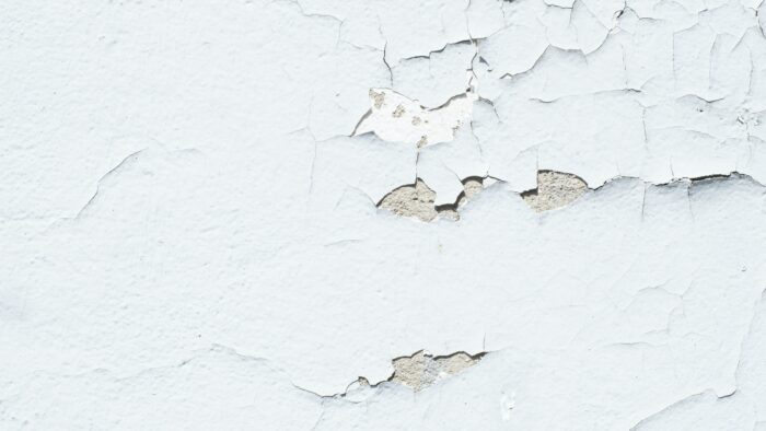 Peeling, cracked, bubbling wall paint