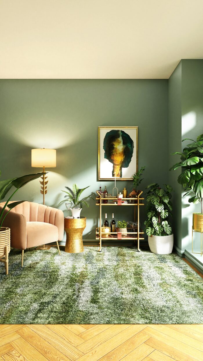 Art deco style room with pink chair, bar cart, and framed art print.