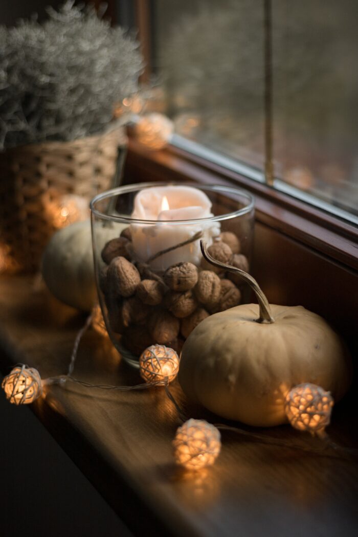 A Cozy Fall Aesthetic with string lights and candles. 